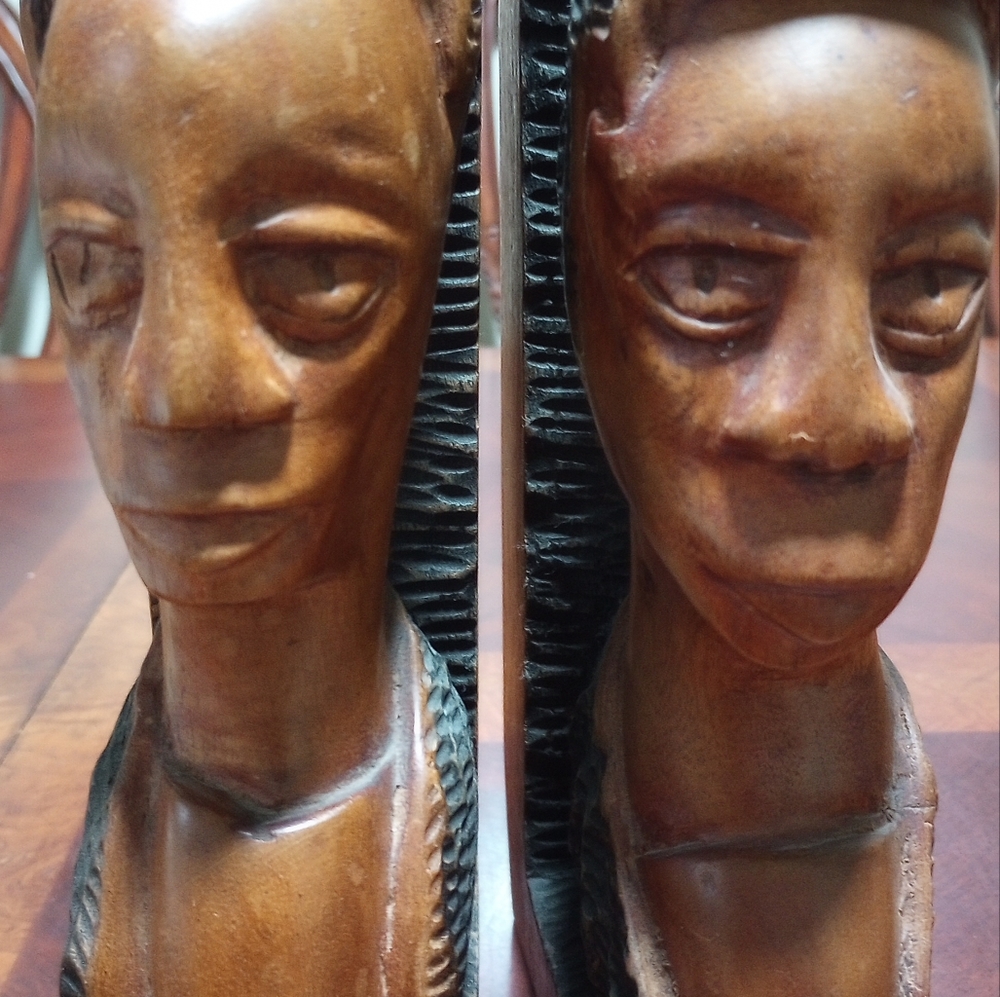 Hand carved and painted wooden bookends